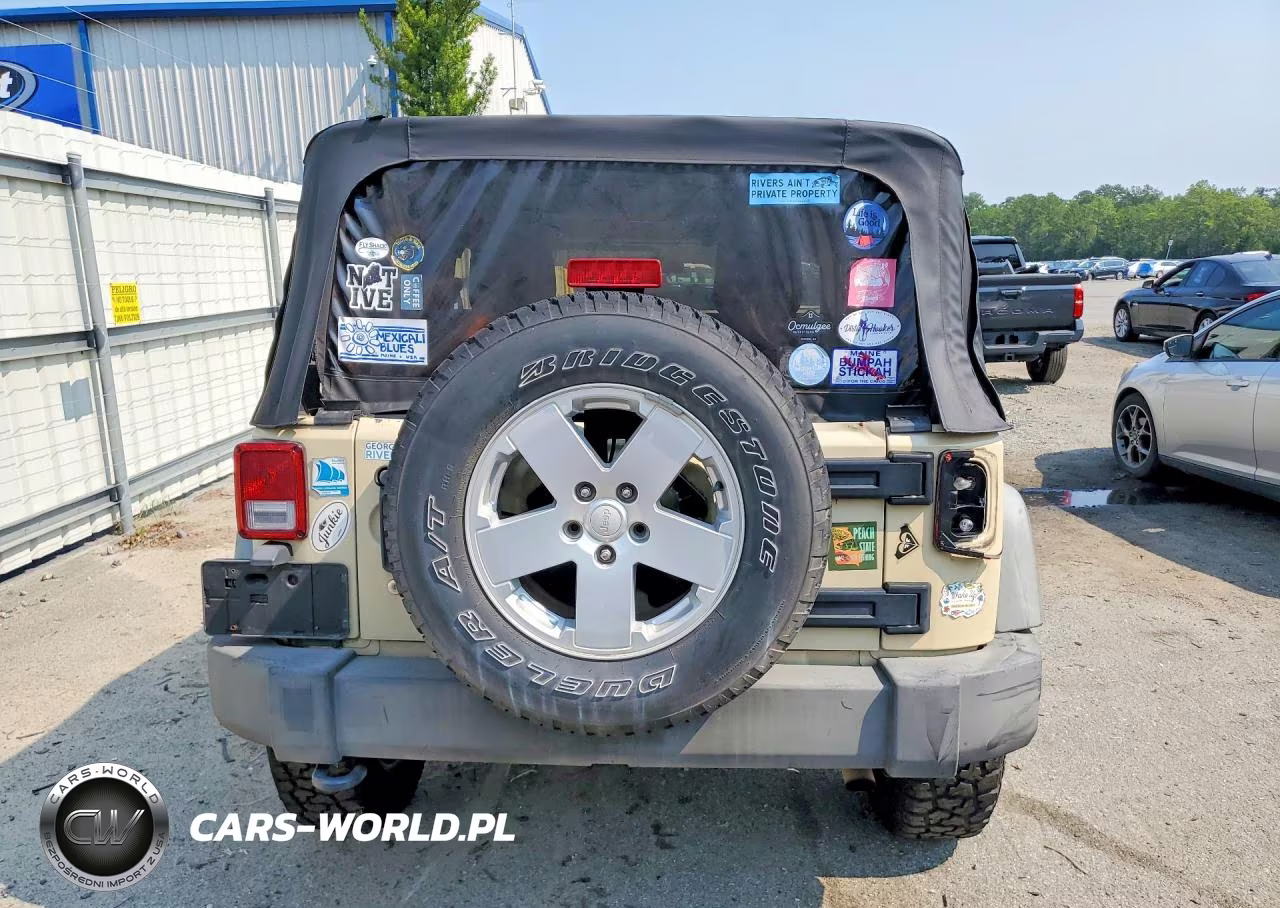 2011 Jeep Wrangler Sport VIN:1J4AA2D17BL525312 - 6