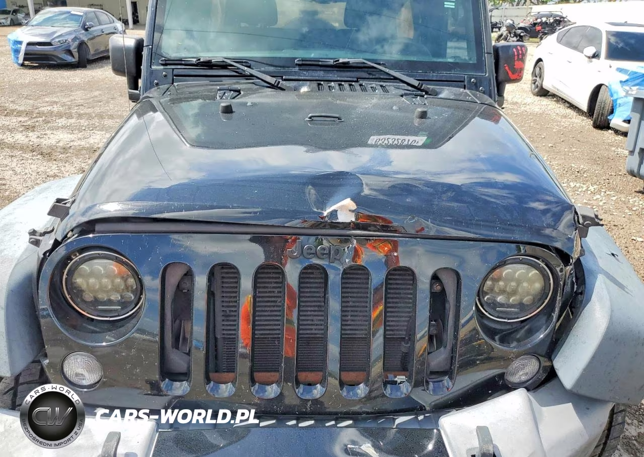 2015 Jeep Wrangler Unlimited Sport VIN:1C4BJWDG9FL675336 - 12