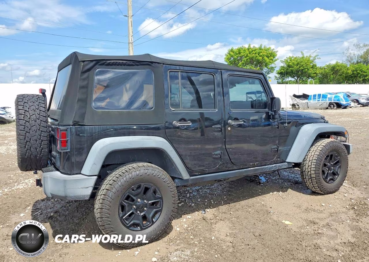 2015 Jeep Wrangler Unlimited Sport VIN:1C4BJWDG9FL675336 - 3
