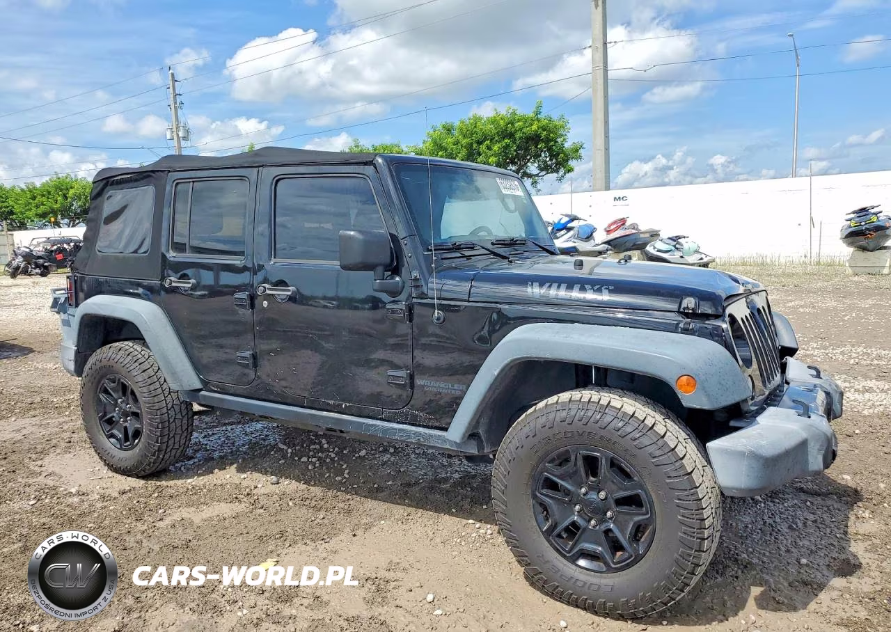 2015 Jeep Wrangler Unlimited Sport VIN:1C4BJWDG9FL675336 - 4