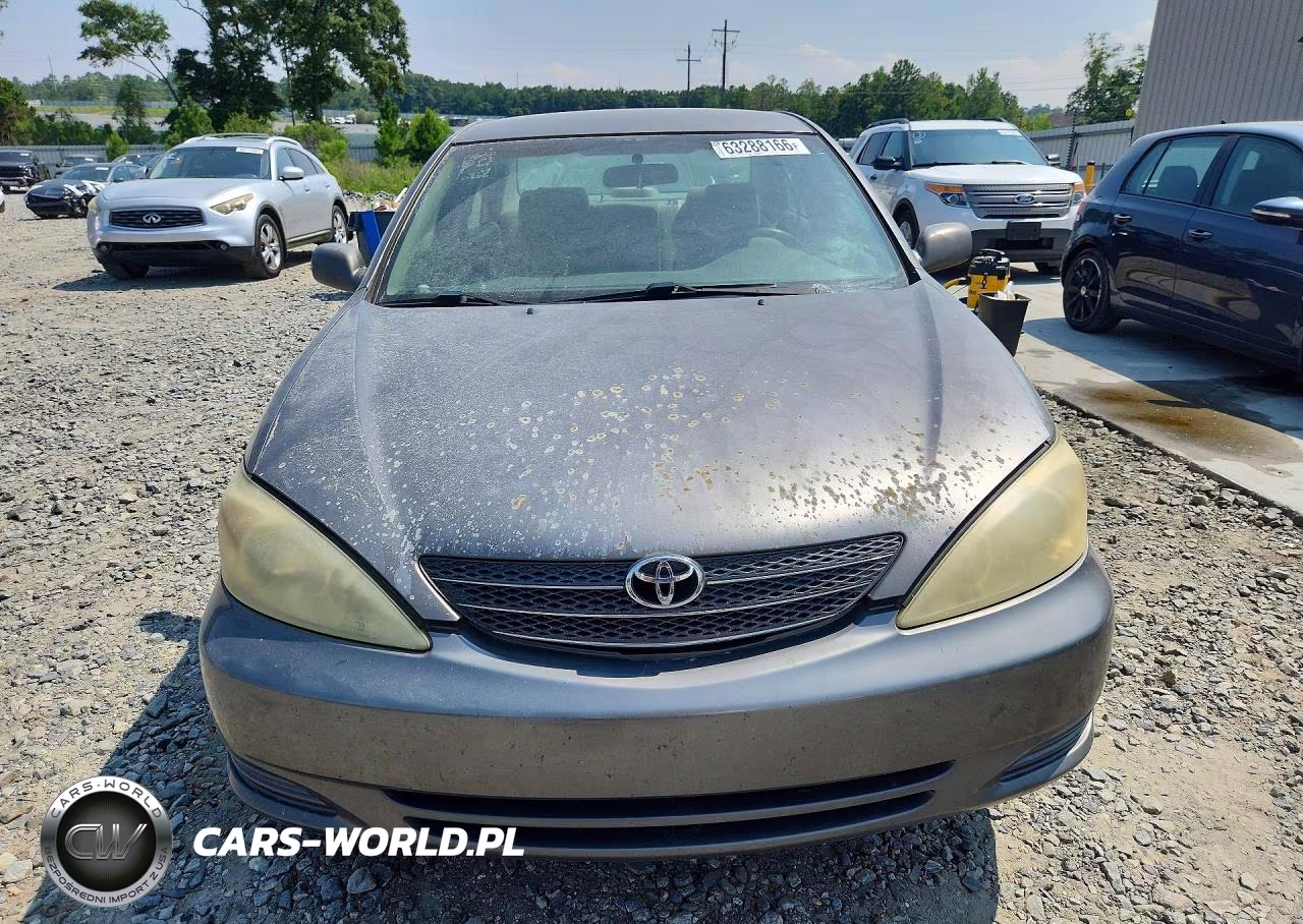 2002 Toyota Camry Le VIN:4T1BE32K12U590873 - 5