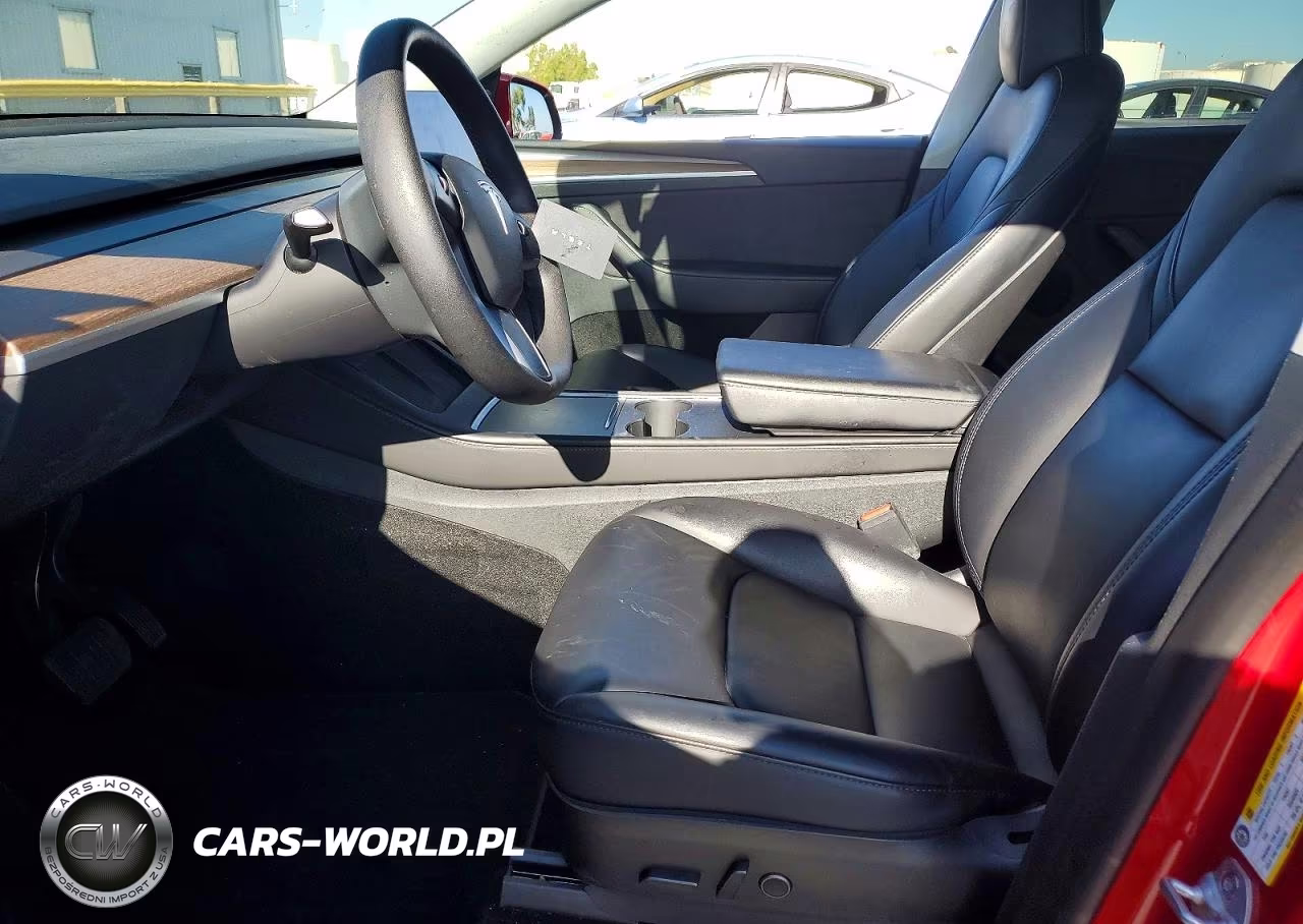 2023 Tesla Model Y VIN:7SAYGAEE1PF696004 - 7