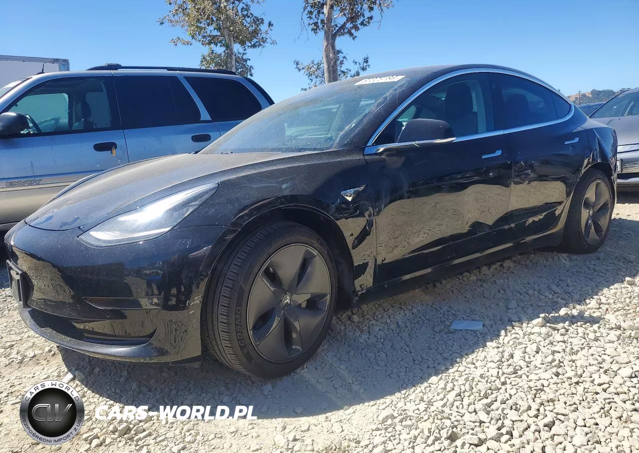 2019 Tesla Model 3 VIN:5YJ3E1EB4KF384884 - 1