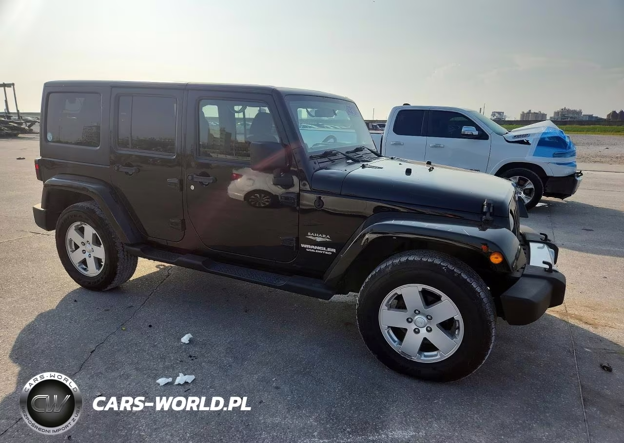 2011 Jeep Wrangler Unlimited Sahara VIN:1J4BA5H17BL533362 - 4