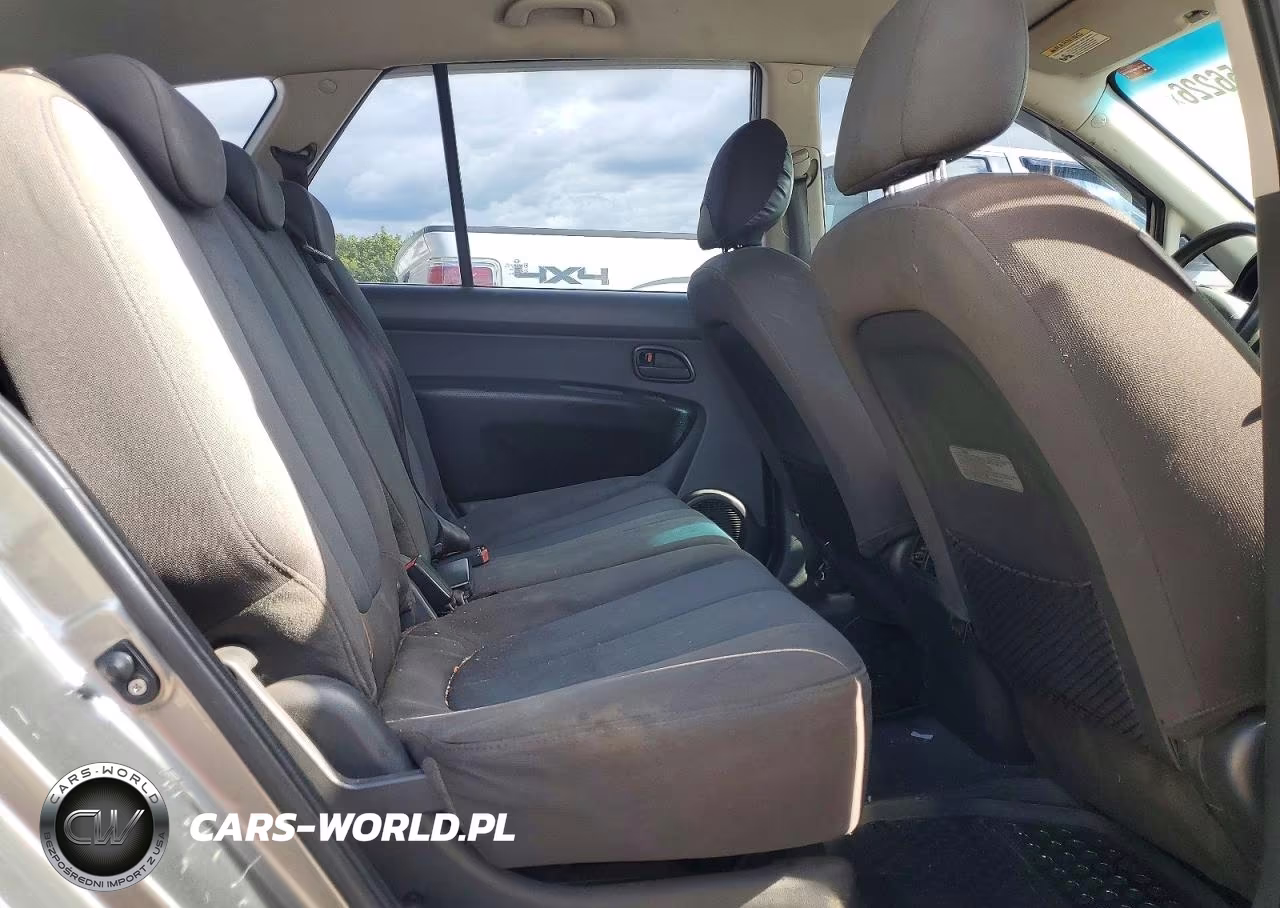 2009 Kia Rondo Base VIN:KNAFG528X97228921 - 11