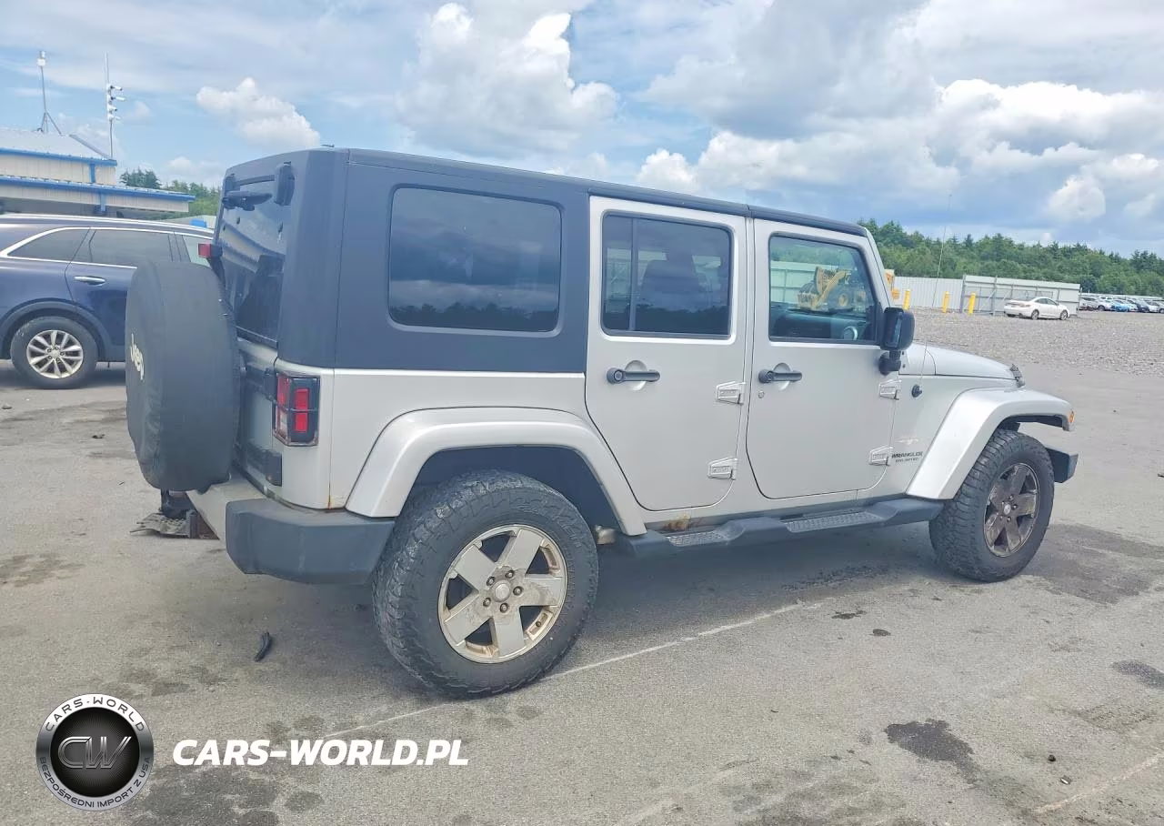 2009 Jeep Wrangler Unlimited Sahara VIN:1J4GA59169L772433 - 3