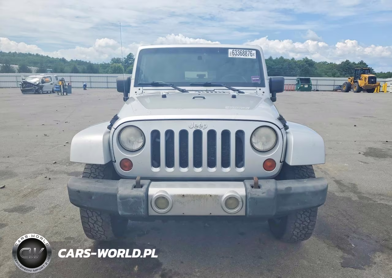2009 Jeep Wrangler Unlimited Sahara VIN:1J4GA59169L772433 - 5