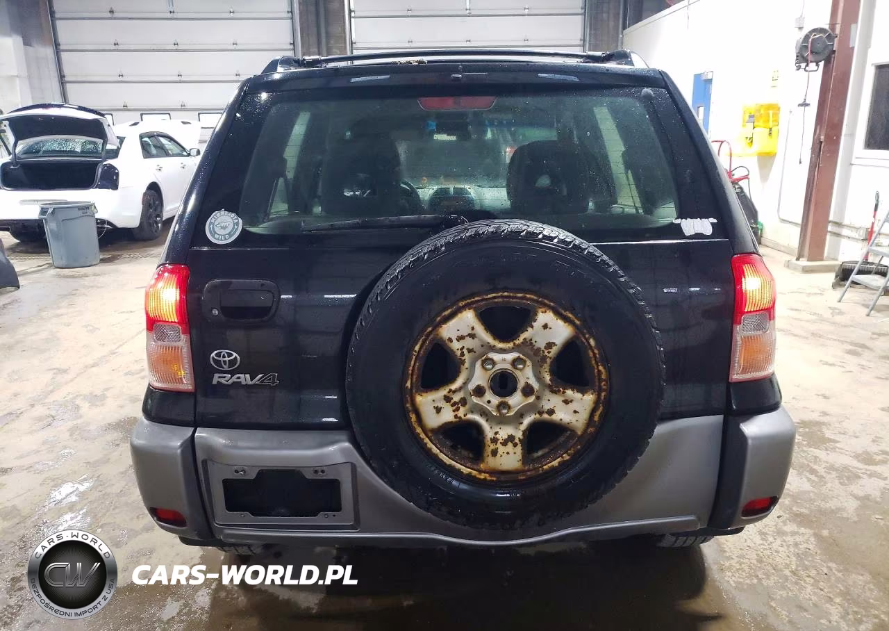 2002 Toyota Rav4 Base VIN:JTEGH20V120047552 - 6
