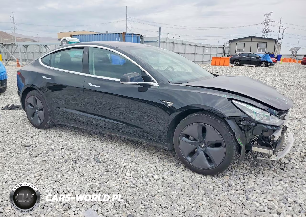 2018 Tesla Model 3 VIN:5YJ3E1EAXJF042216 - 4