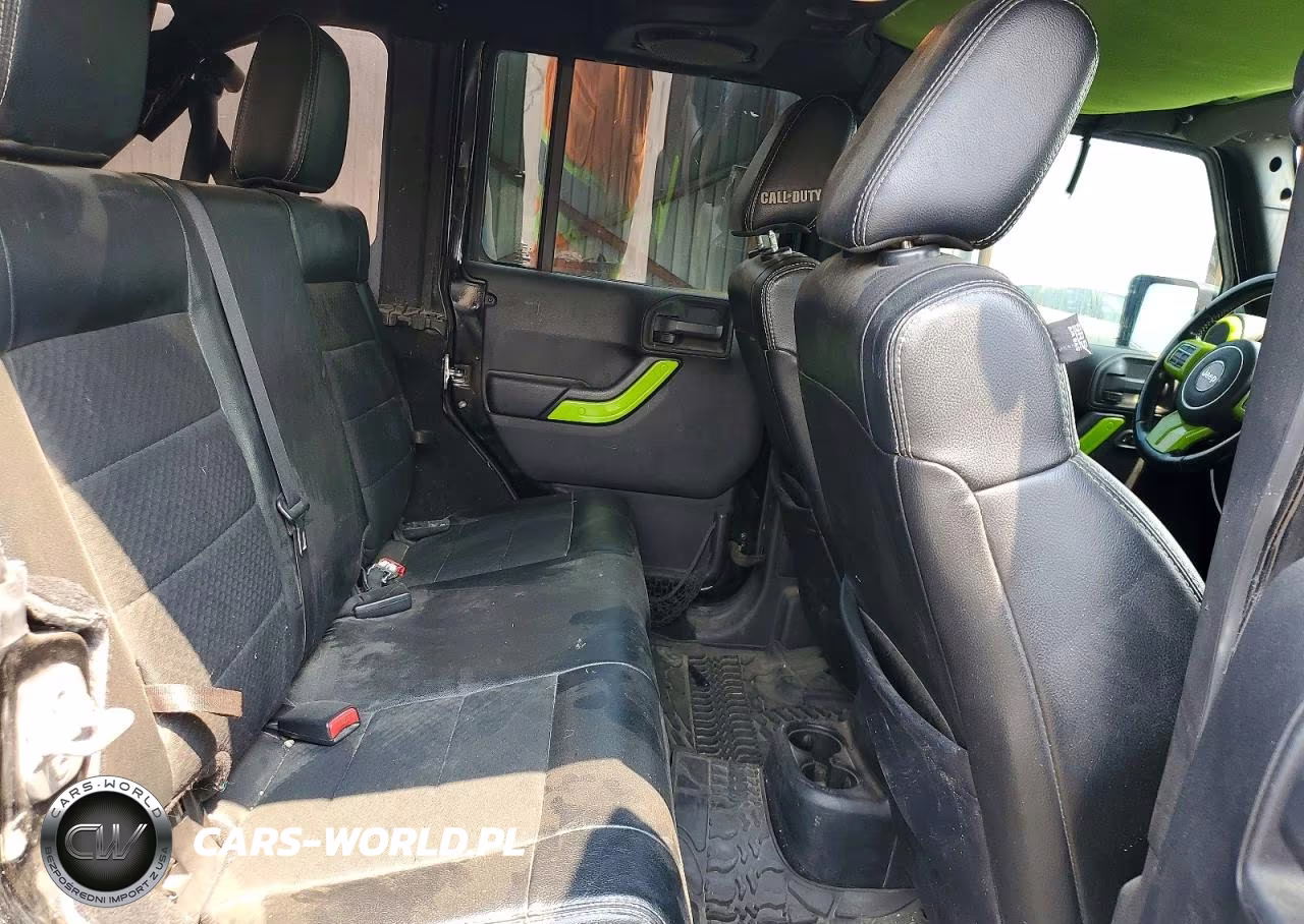 2011 Jeep Wrangler Unlimited Rubicon VIN:1J4HA6H10BL502437 - 11