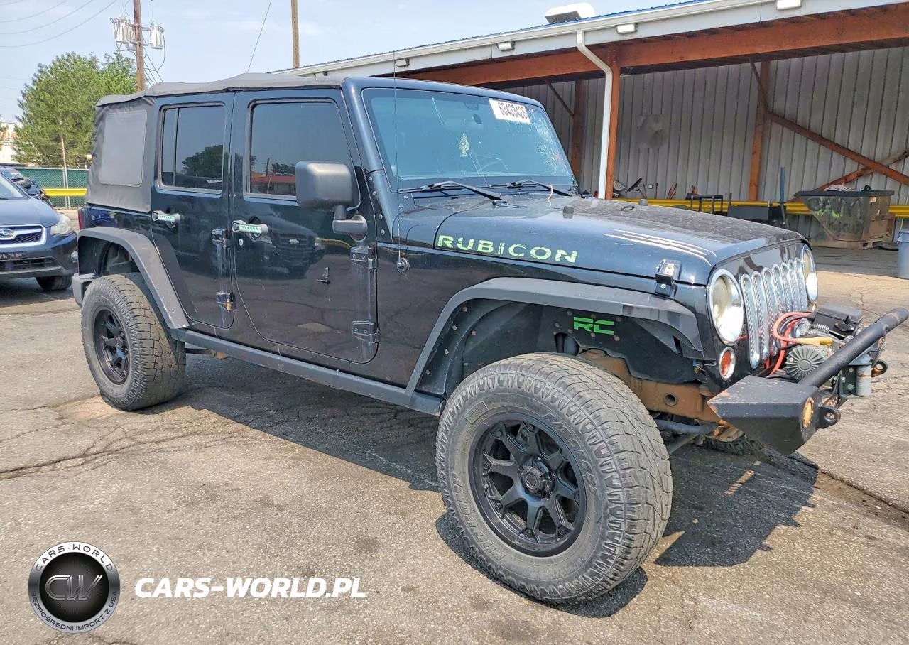 2011 Jeep Wrangler Unlimited Rubicon VIN:1J4HA6H10BL502437 - 4