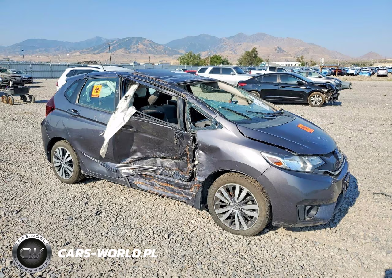2015 Honda Fit VIN:3HGGK5H84FM731571 - 4