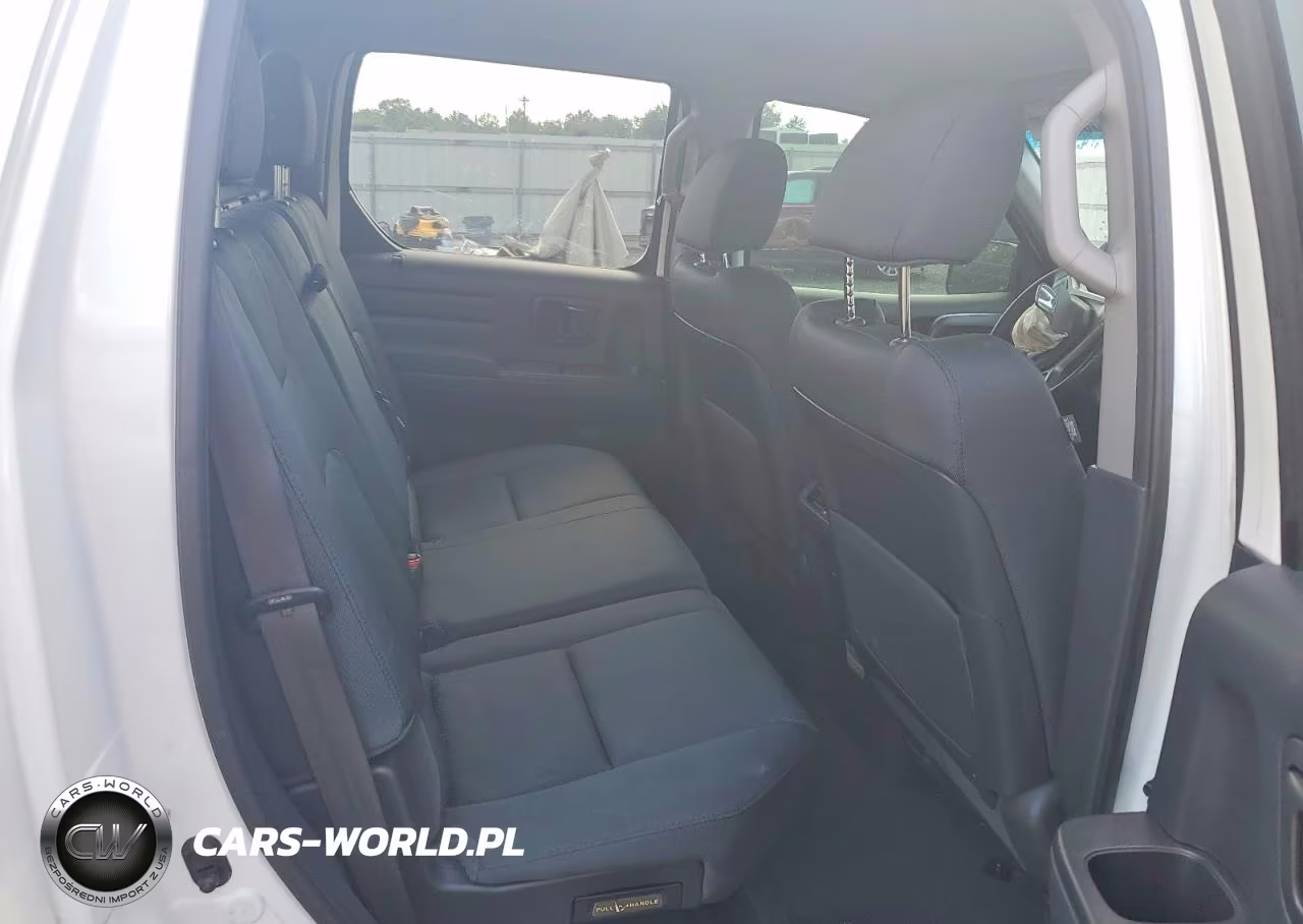 2012 Honda Ridgeline Sport VIN:5FPYK1F7XCB001743 - 11