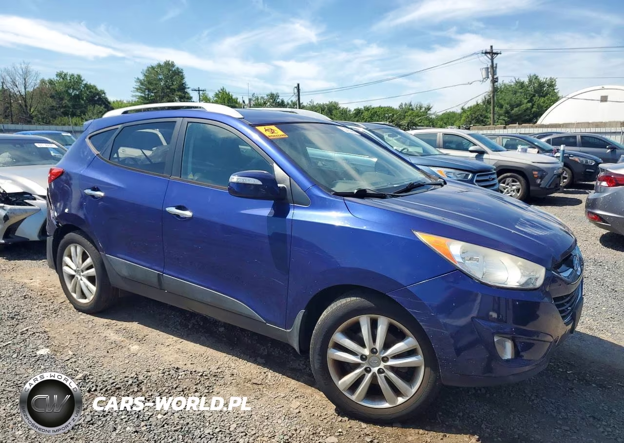 2012 Hyundai Tucson Limited VIN:KM8JUCAC9CU382105 - 4