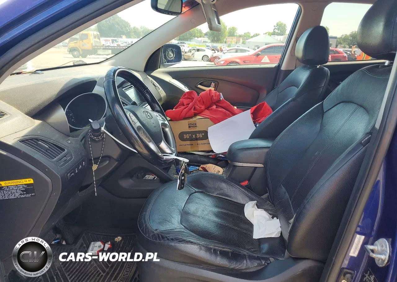 2012 Hyundai Tucson Limited VIN:KM8JUCAC9CU382105 - 7