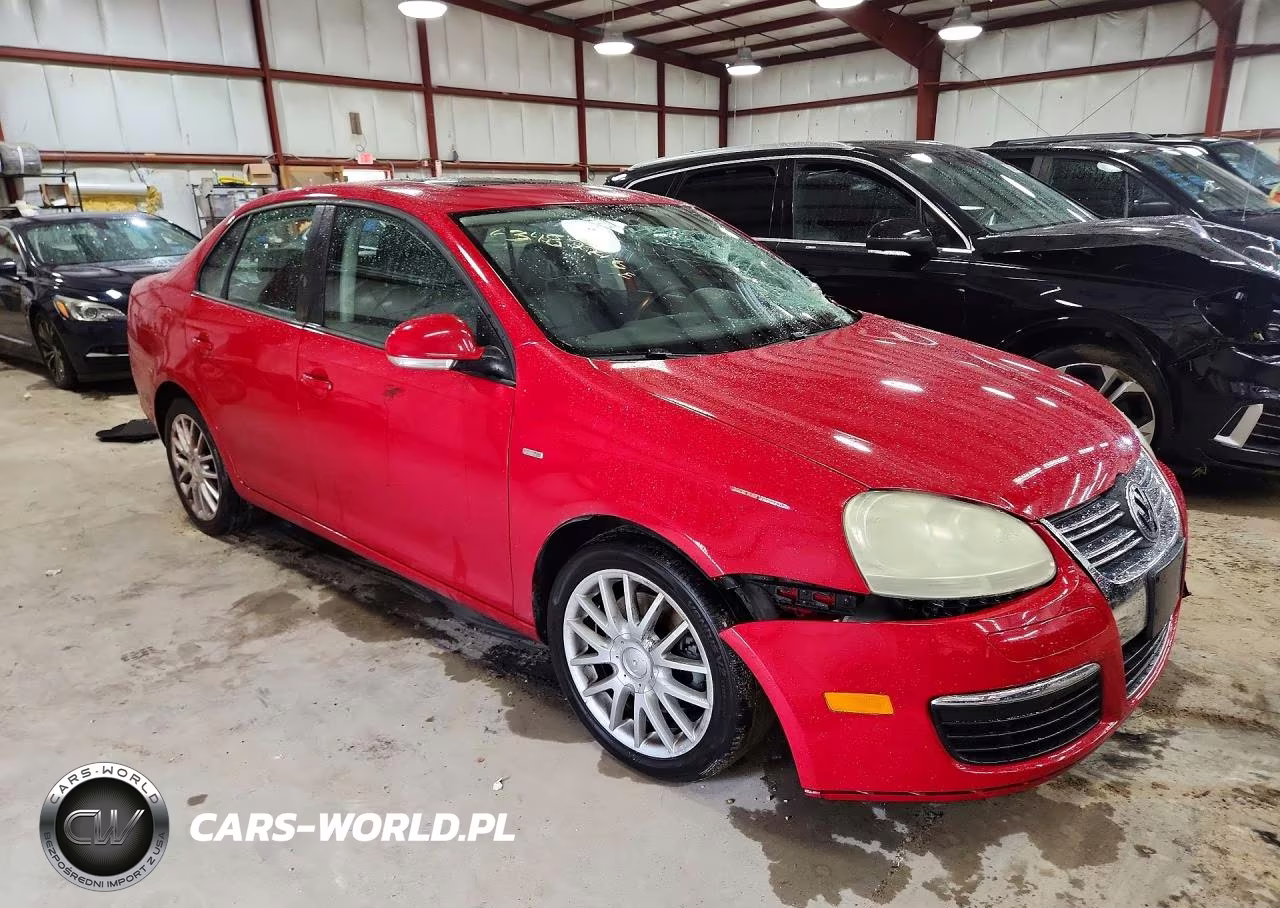 2009 Volkswagen Jetta Wolfsburg VIN:3VWRJ71K49M019400 - 4