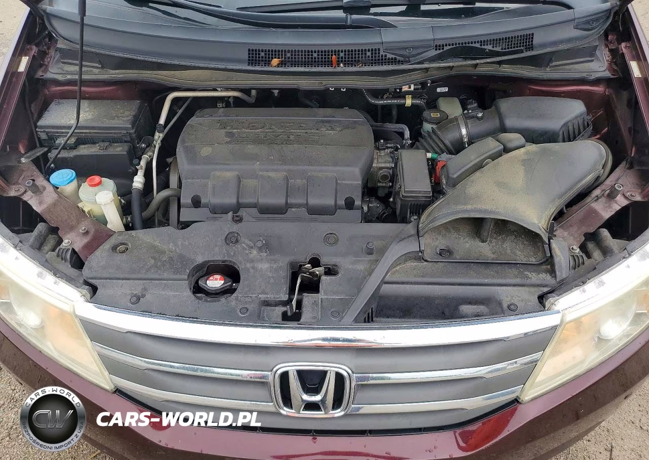 2012 Honda Odyssey Touring VIN:5FNRL5H90CB138447 - 12