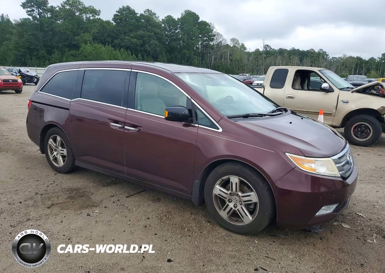 2012 Honda Odyssey Touring VIN:5FNRL5H90CB138447 - 4