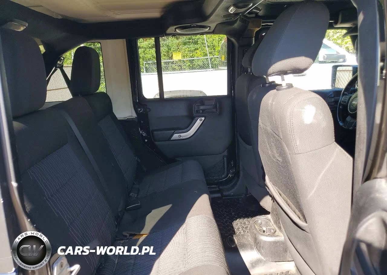 2012 Jeep Wrangler Unlimited Rubicon VIN:1C4BJWFG5CL104693 - 11