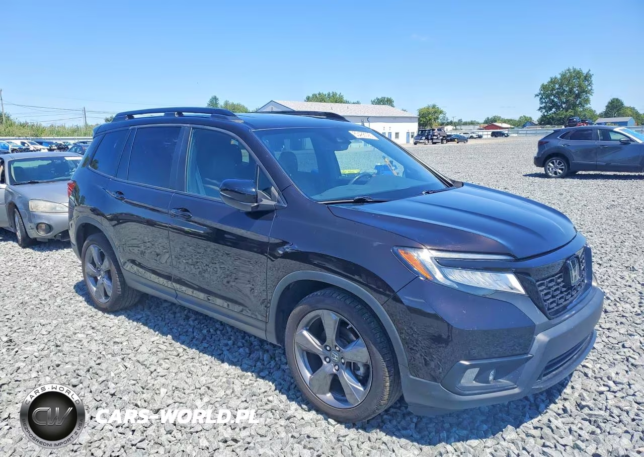 2019 Honda Passport Touring VIN:5FNYF7H91KB007993 - 4