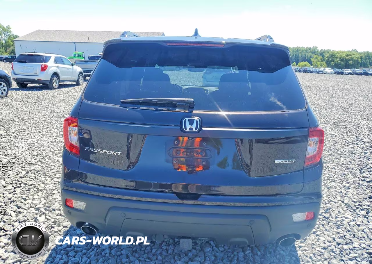 2019 Honda Passport Touring VIN:5FNYF7H91KB007993 - 6