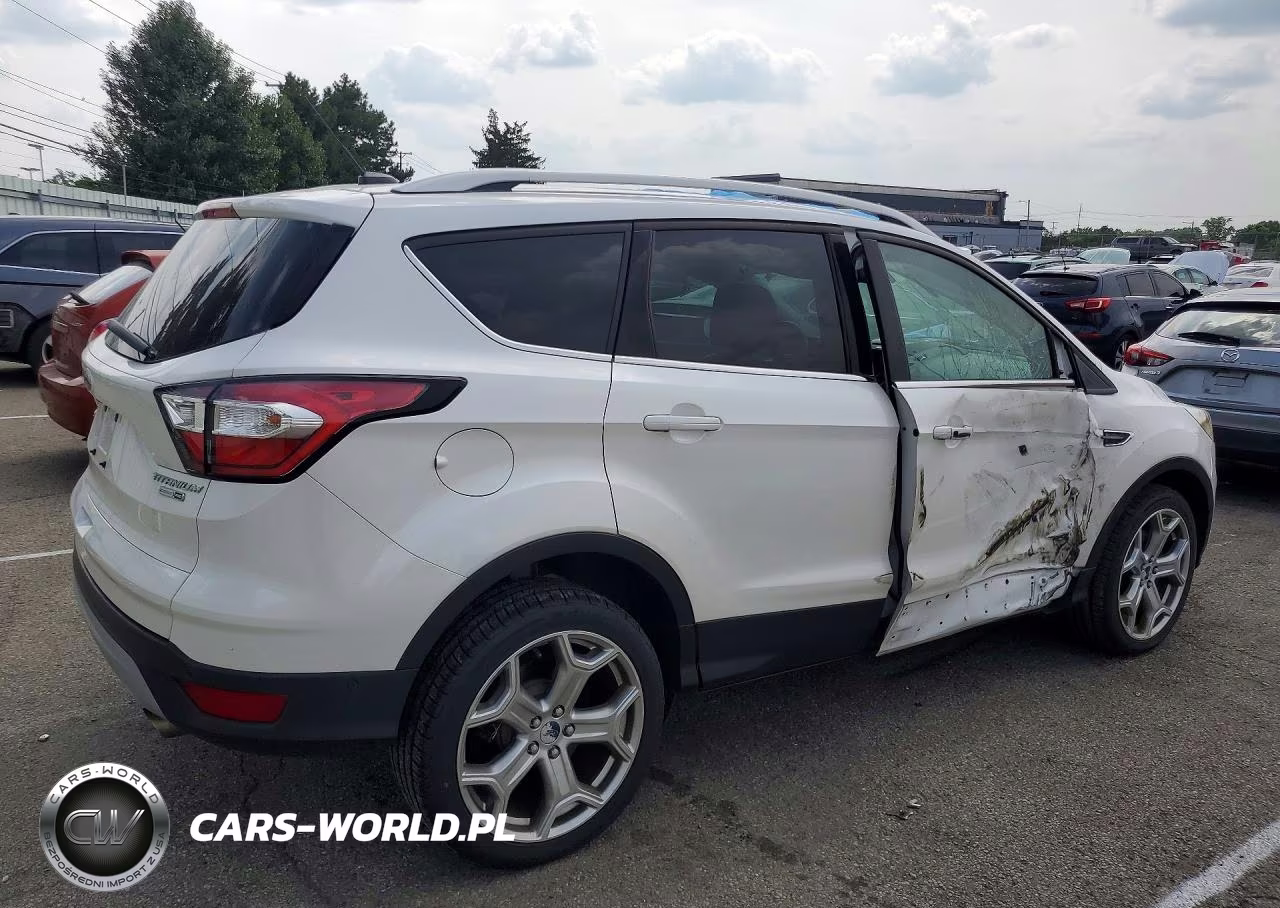 2017 Ford Escape Titanium VIN:1FMCU9J90HUA00731 - 3