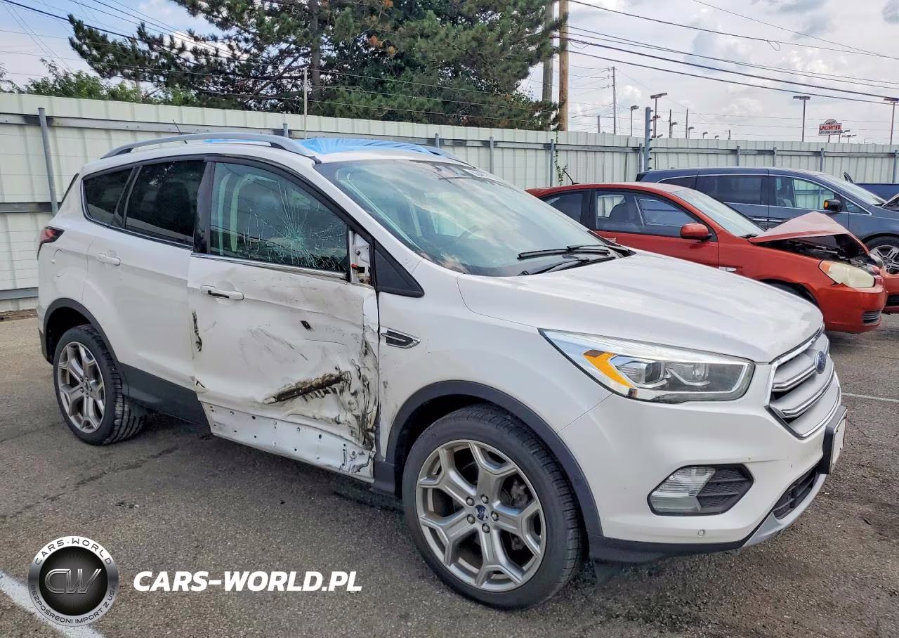 2017 Ford Escape Titanium VIN:1FMCU9J90HUA00731 - 4