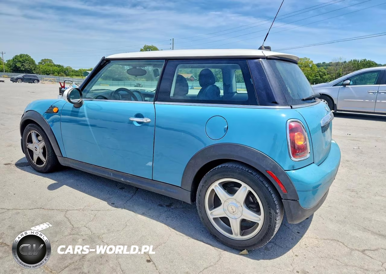 2010 Mini Cooper VIN:WMWMF3C53ATZ22039 - 2