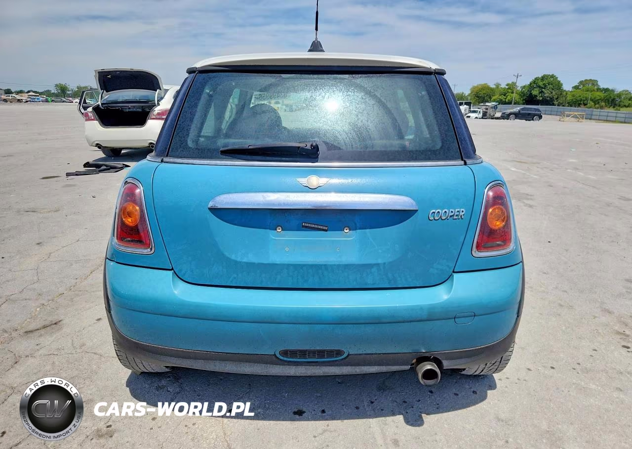 2010 Mini Cooper VIN:WMWMF3C53ATZ22039 - 6
