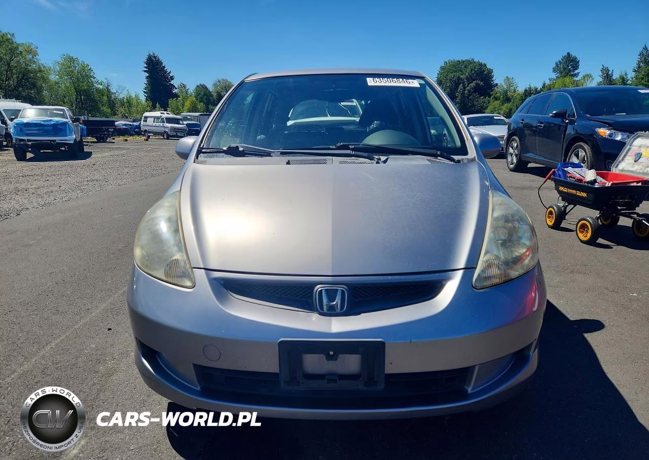 2007 Honda Fit VIN:JHMGD38497S058018 - 5