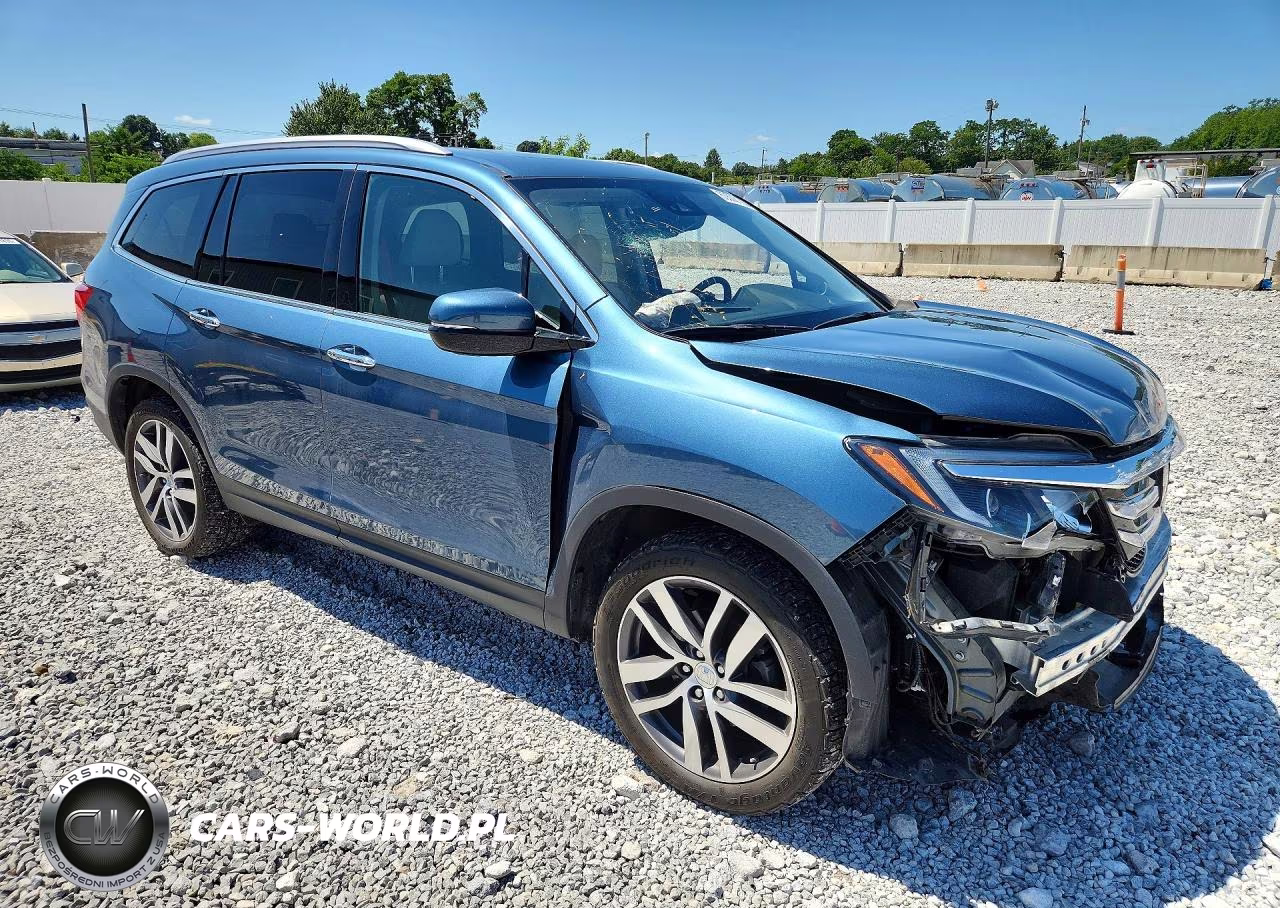 2017 Honda Pilot Elite VIN:5FNYF6H07HB009462 - 4