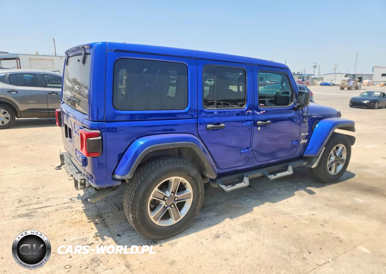 2019 Jeep Wrangler Unlimited Sahara VIN:1C4HJXEG9KW643302 - 3