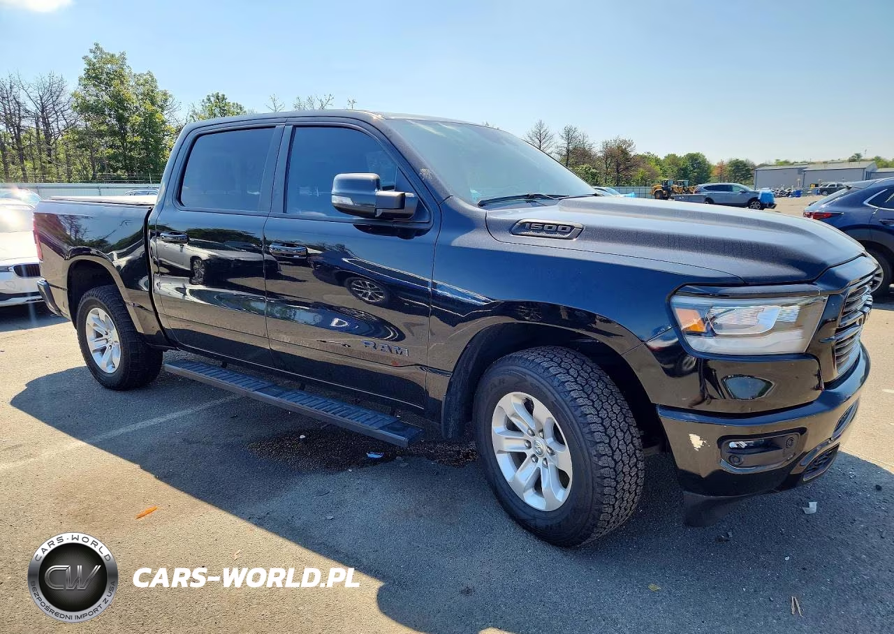 2023 Ram 1500 Laramie VIN:1C6SRFJT9PN704499 - 4