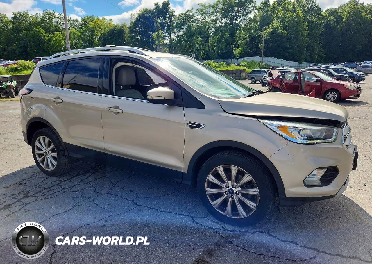 2017 Ford Escape Titanium VIN:1FMCU0JD9HUD90373 - 4