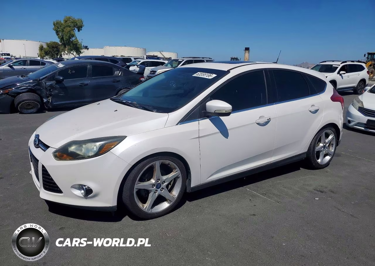 2014 Ford Focus Titanium VIN:1FADP3N28EL176623 - 1