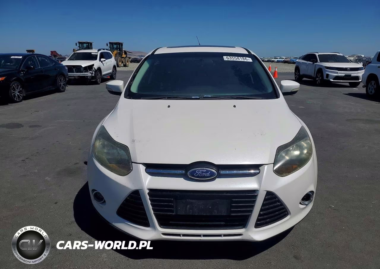 2014 Ford Focus Titanium VIN:1FADP3N28EL176623 - 5