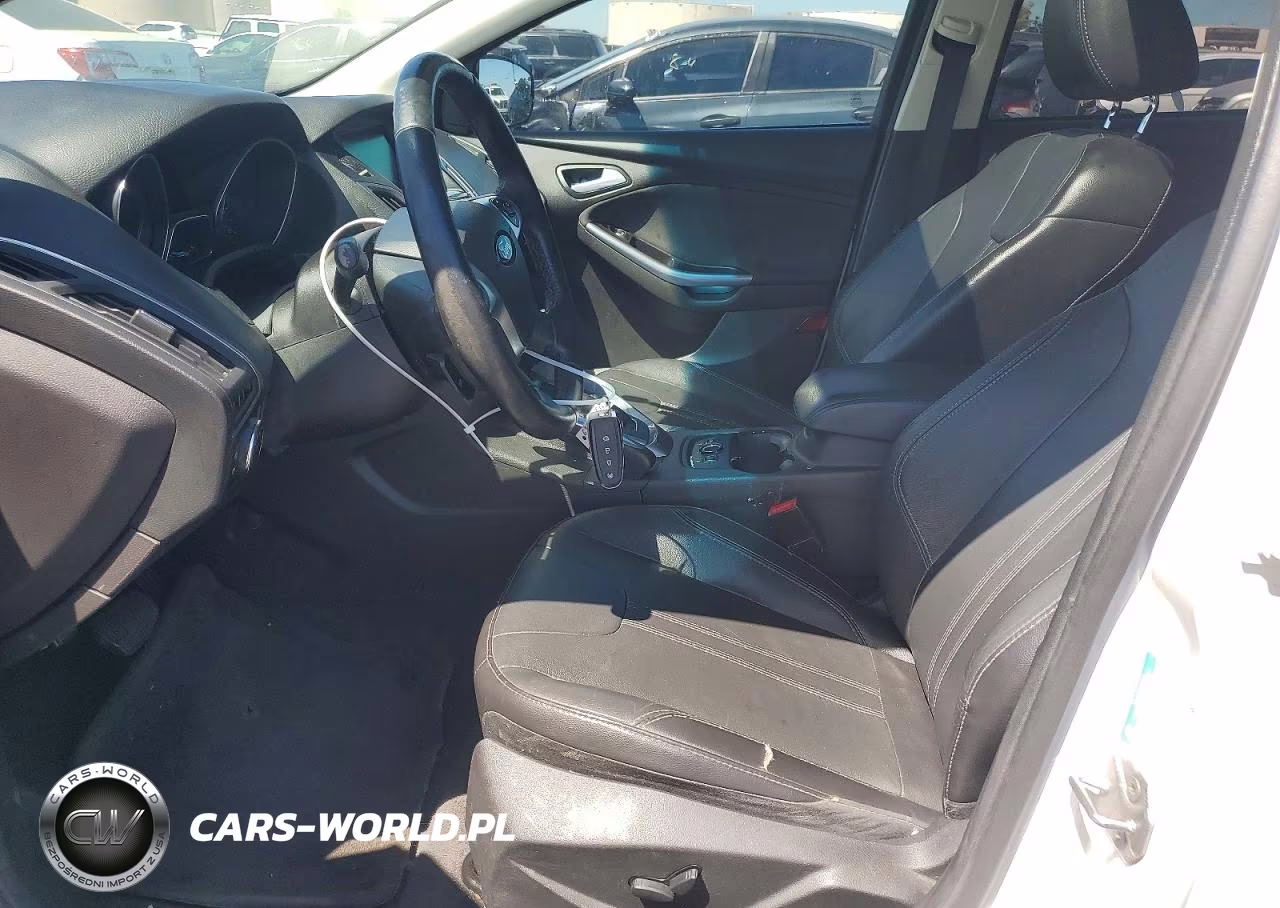 2014 Ford Focus Titanium VIN:1FADP3N28EL176623 - 7