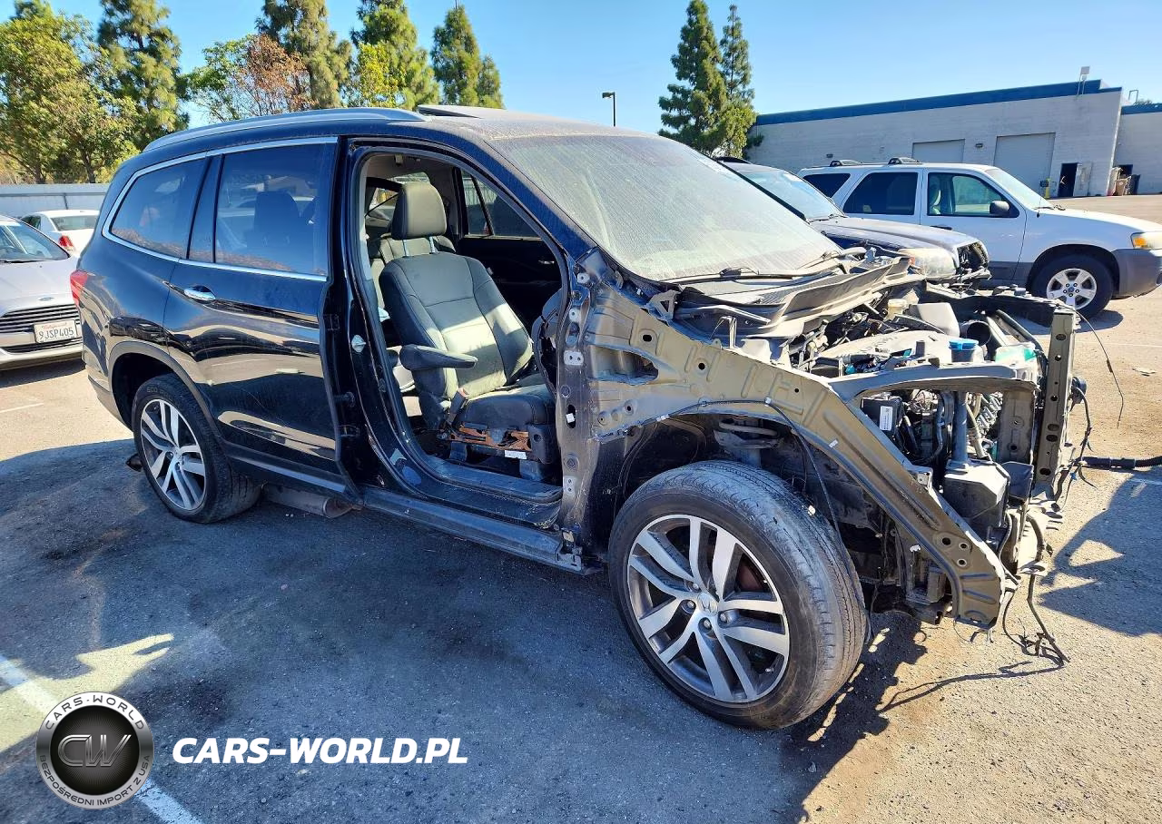 2018 Honda Pilot Touring VIN:5FNYF6H93JB044987 - 4