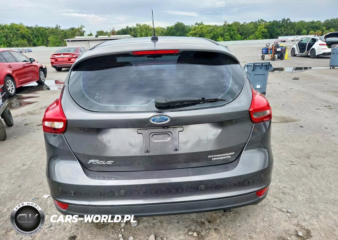 2015 Ford Focus Titanium VIN:1FADP3N20FL215304 - 6