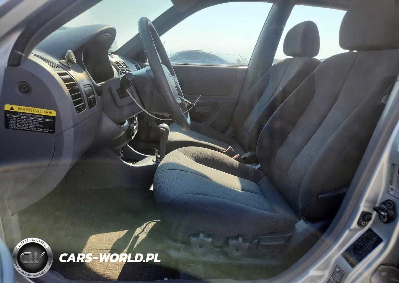 2005 Hyundai Accent Gls VIN:KMHCG45C05U578484 - 7