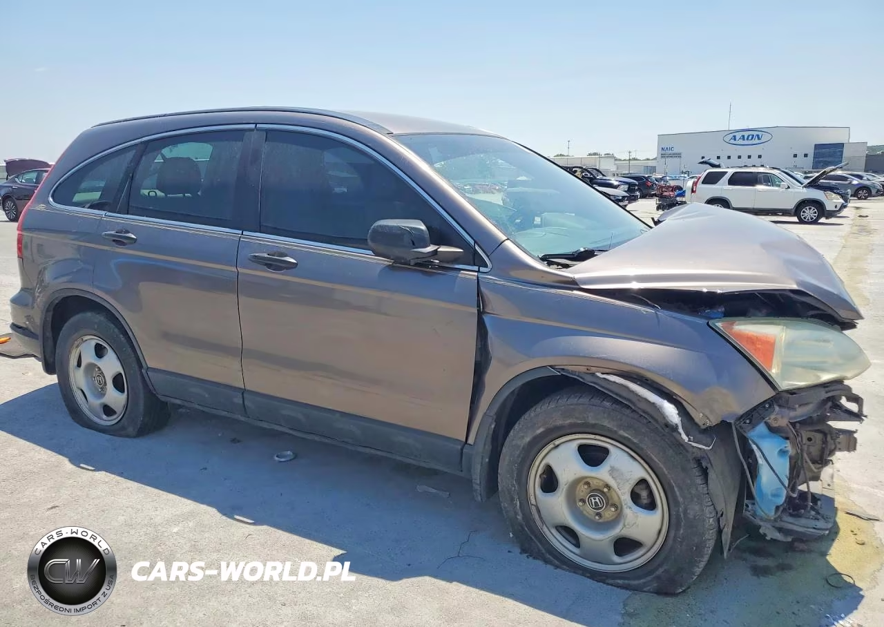 2010 Honda Cr-V Lx VIN:5J6RE3H33AL047378 - 4