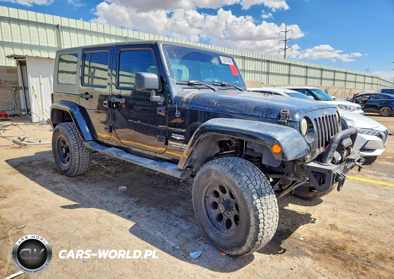 2009 Jeep Wrangler Unlimited Sahara VIN:1J4GA59189L741068 - 4