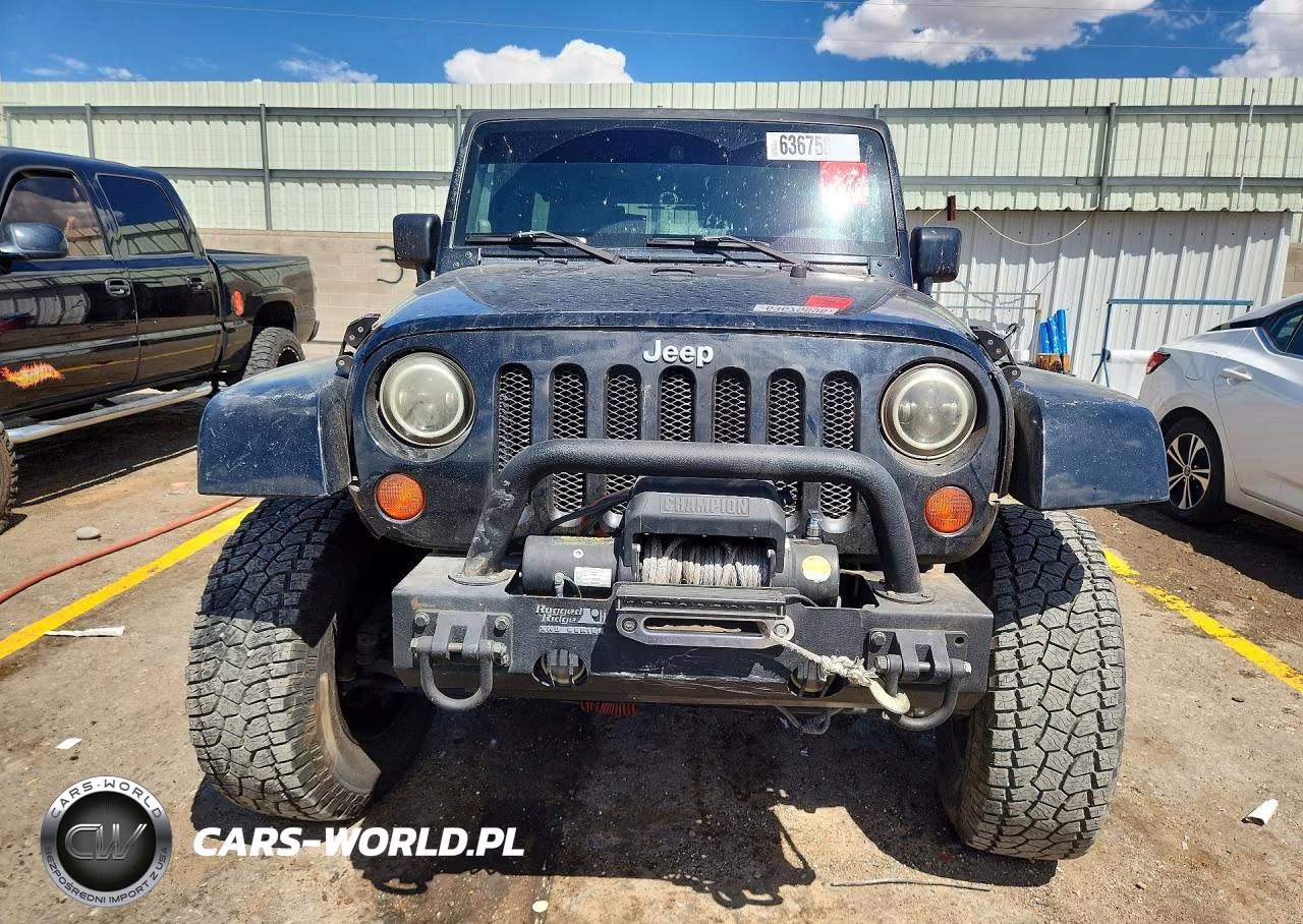 2009 Jeep Wrangler Unlimited Sahara VIN:1J4GA59189L741068 - 5