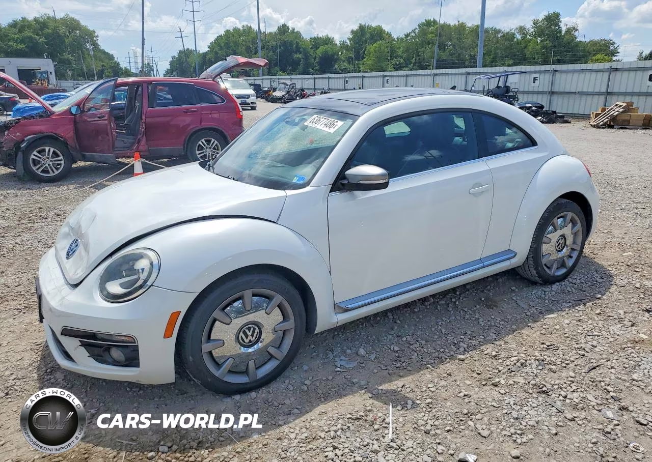 2014 Volkswagen Beetle VIN:3VWJL7AT9EM653103 - 1