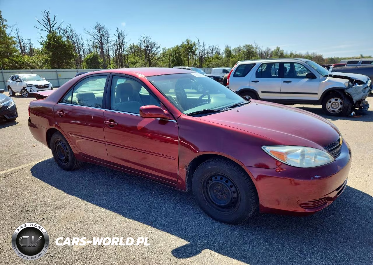 2002 Toyota Camry Le VIN:4T1BE32K12U032201 - 4