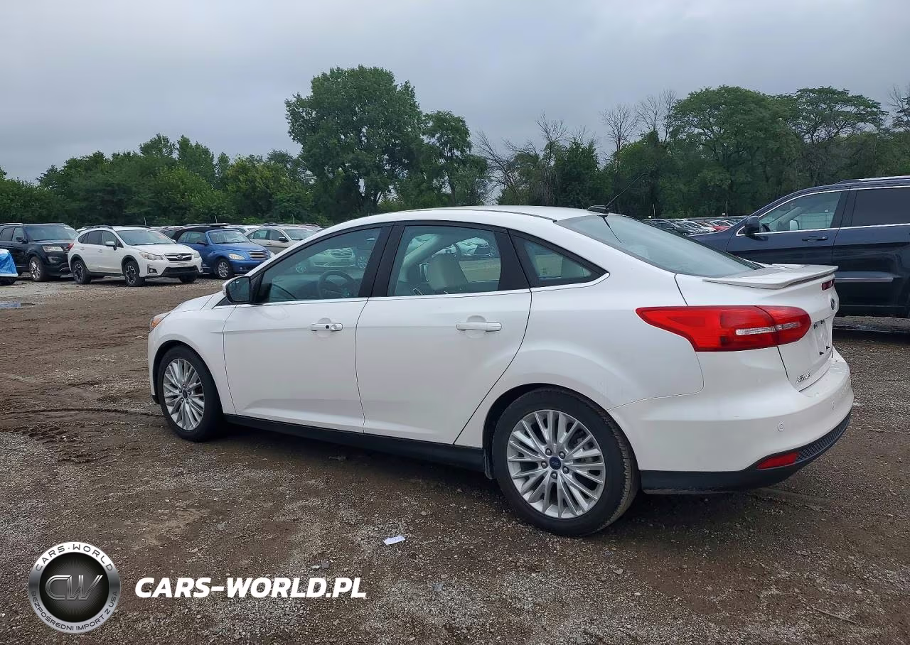 2015 Ford Focus Titanium VIN:1FADP3J28FL299913 - 2