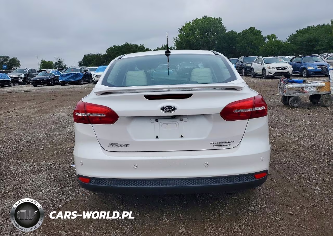 2015 Ford Focus Titanium VIN:1FADP3J28FL299913 - 6