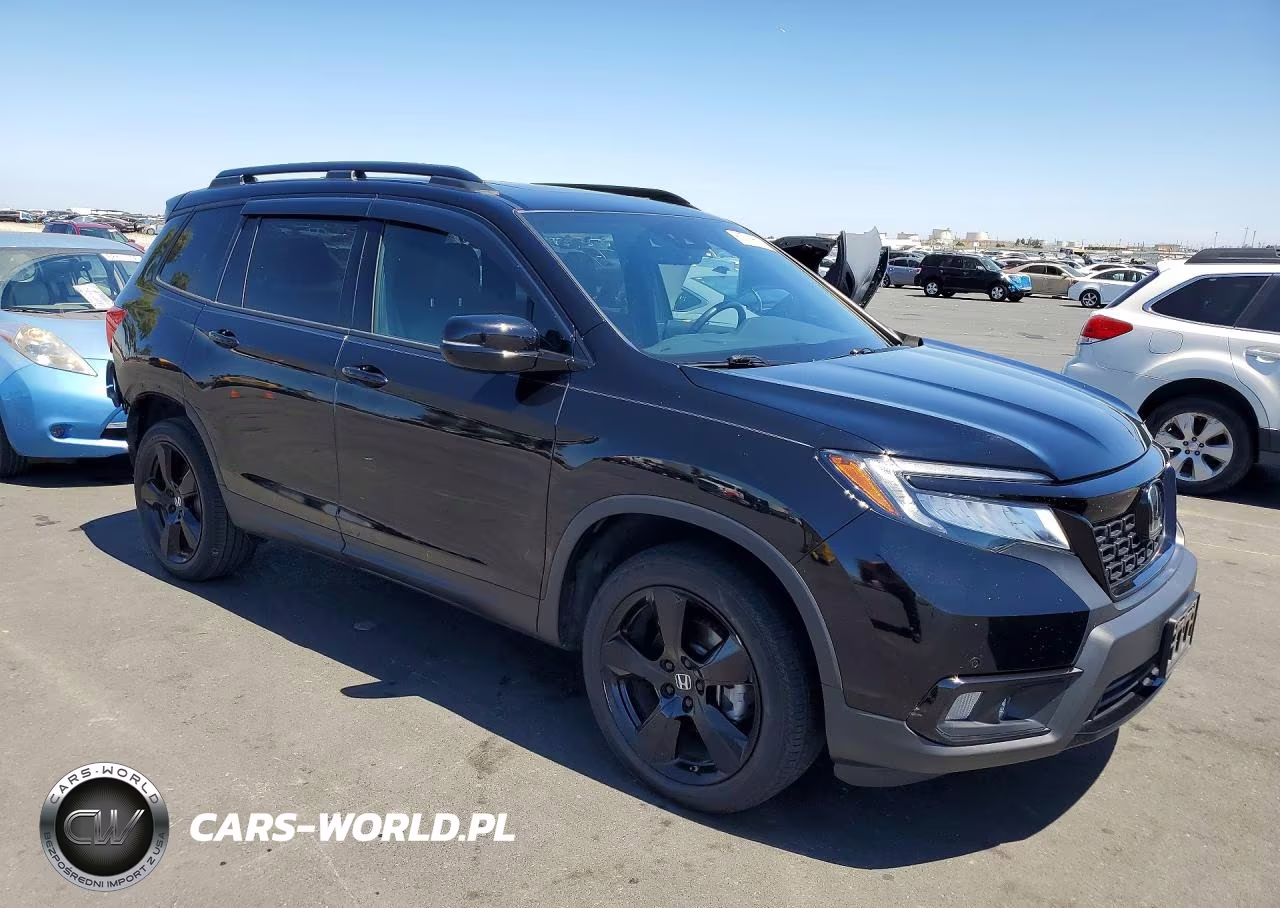 2021 Honda Passport Elite VIN:5FNYF8H01MB003002 - 4