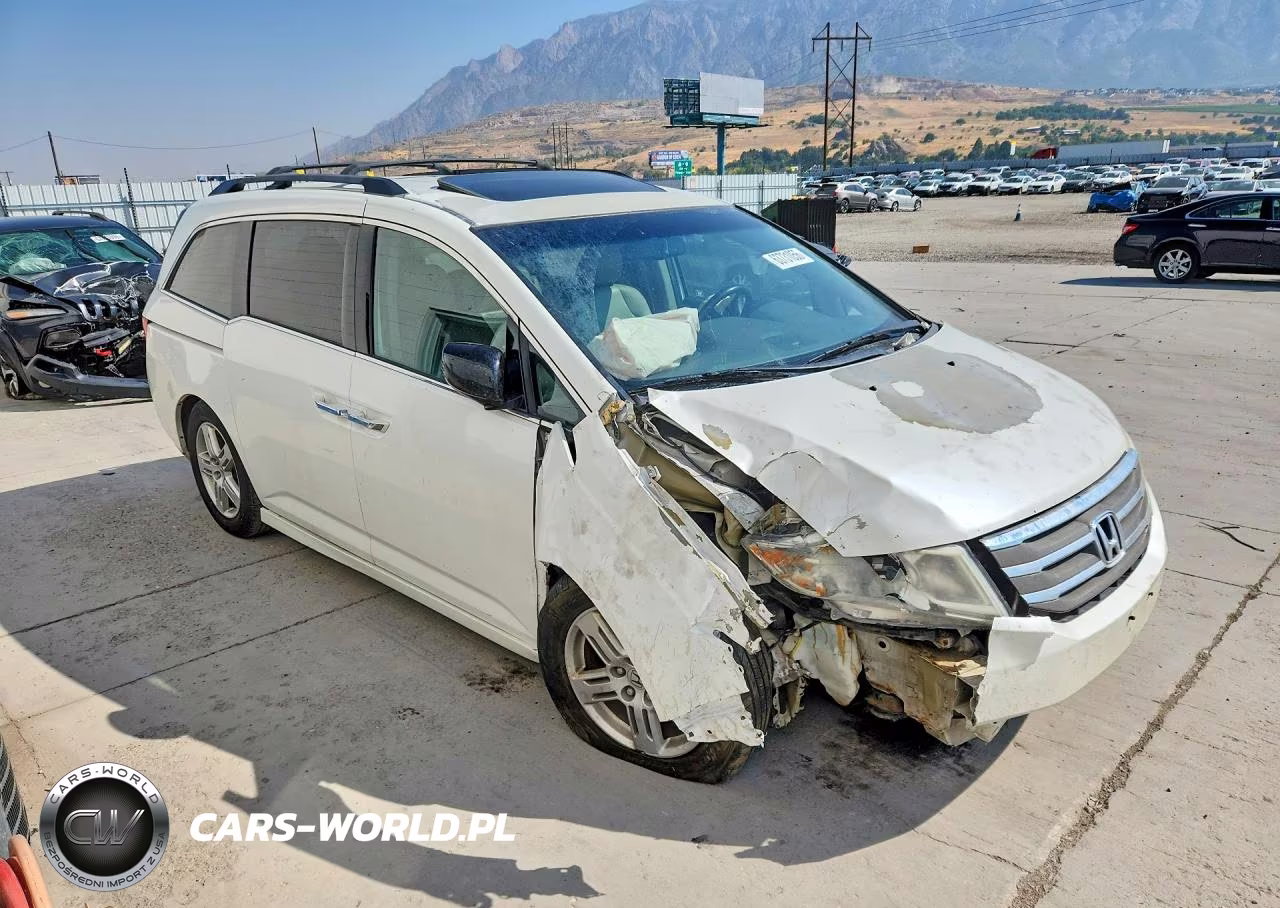 2012 Honda Odyssey Touring VIN:5FNRL5H95CB034844 - 4