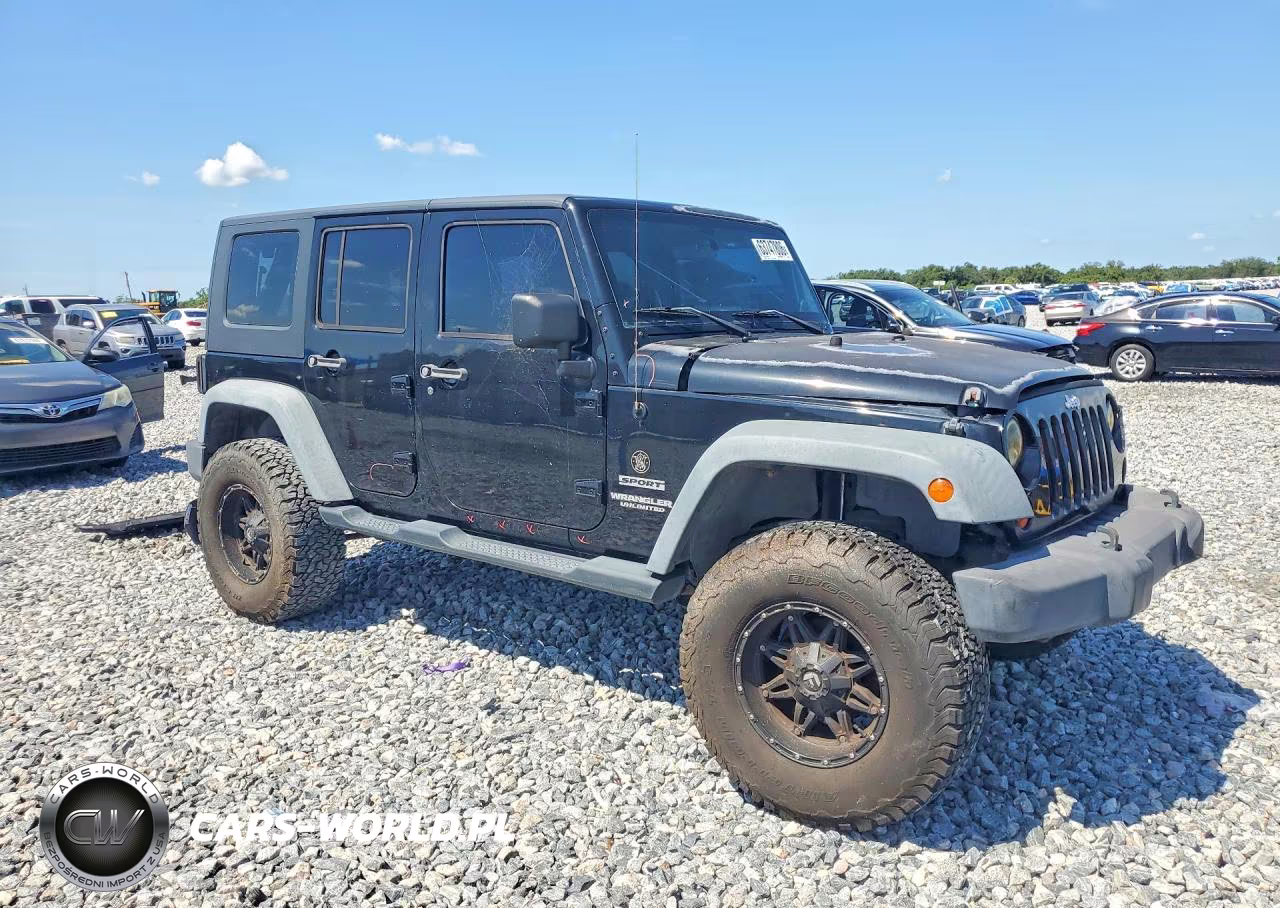 2011 Jeep Wrangler Unlimited Sport VIN:1J4BA3H15BL591720 - 4